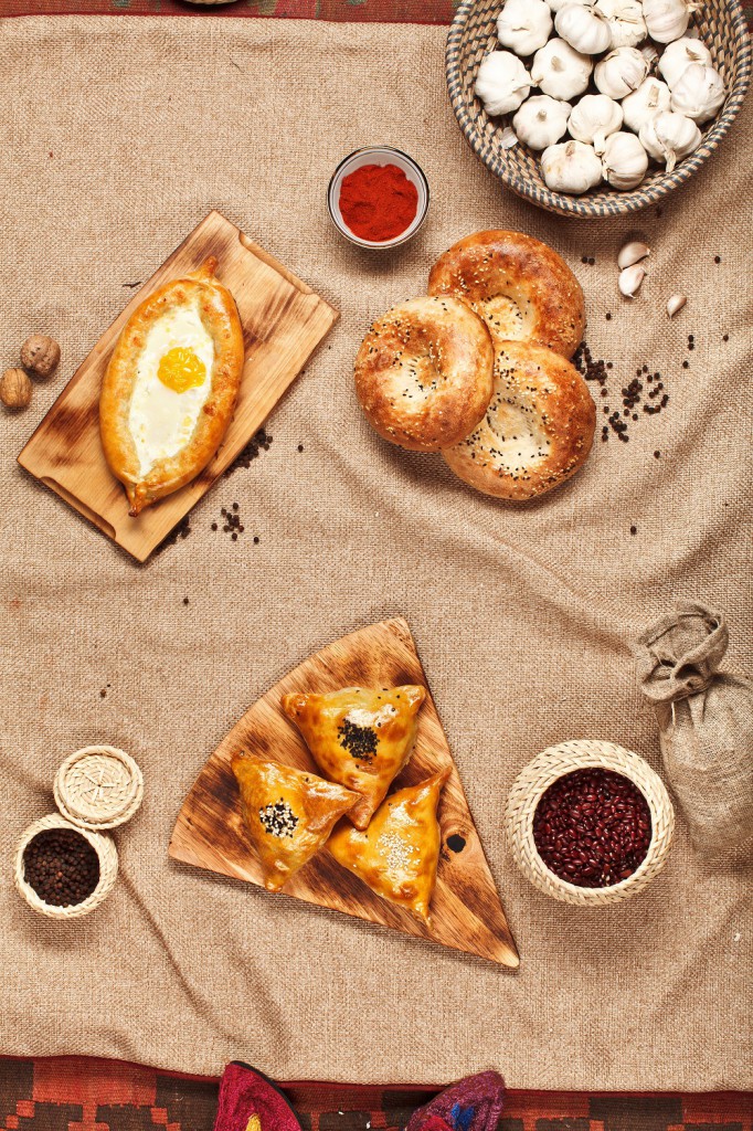 Georgian or Uzbek food set with khachapuri and samsa