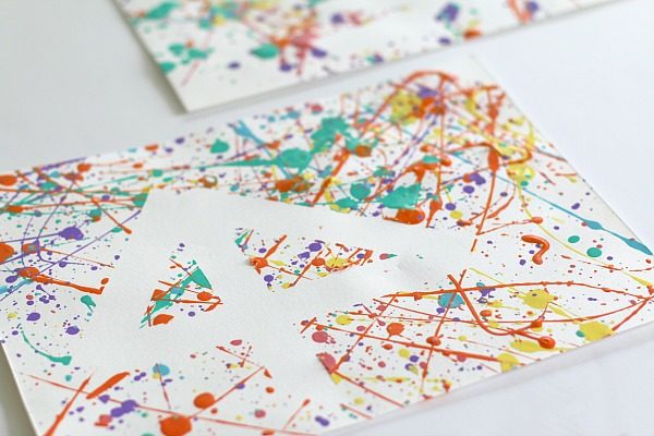 http://buggyandbuddy.com/easy-art-projects-kids-splatter-paint-tape-resist/