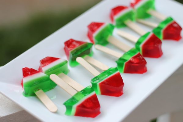 http://www.thatssomichelle.com/2012/05/watermelon-jello-shots-on-popsicle.html